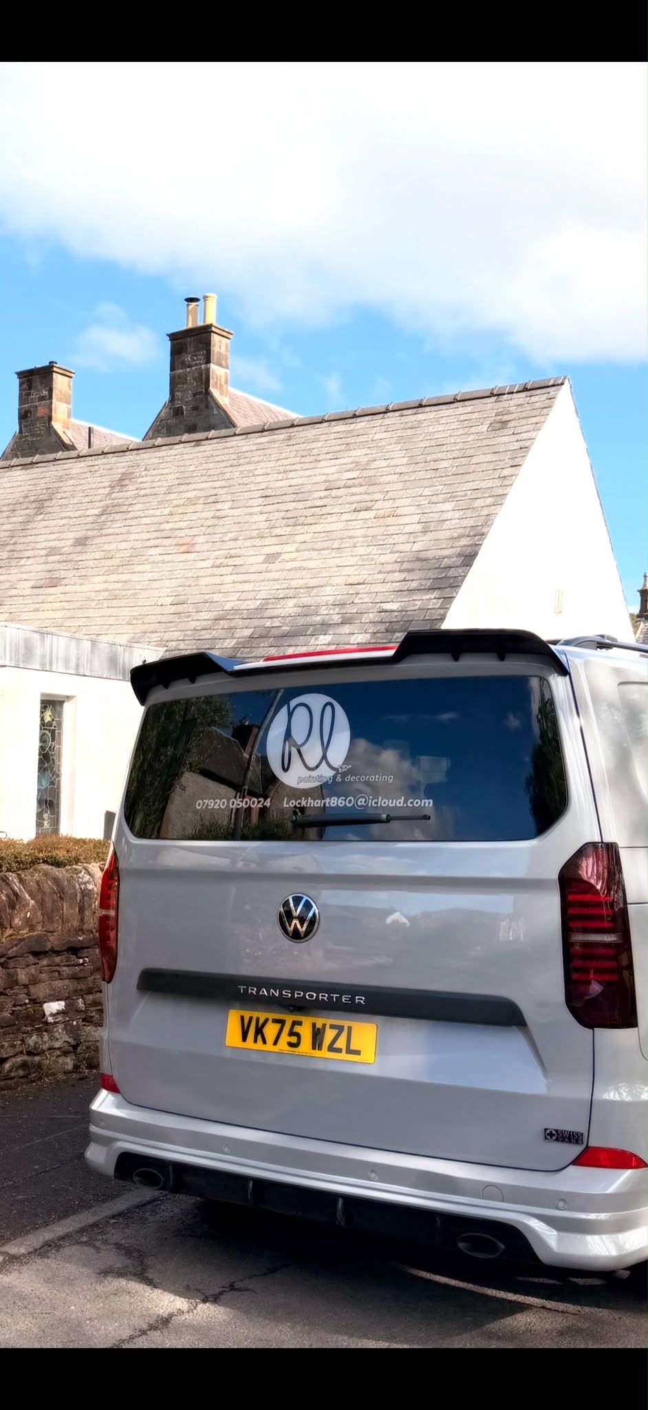 Ricky Lockhart Painting & Decorating branded van parked at a completed project